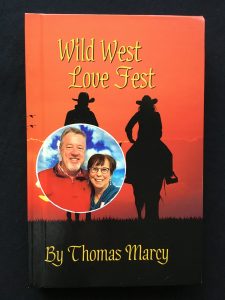 Tom and Marcy Gallagher appear on the cover of the new book they wrote for YourNovel.com, Wild West Love Fest with the pen name Thomas Marcy.